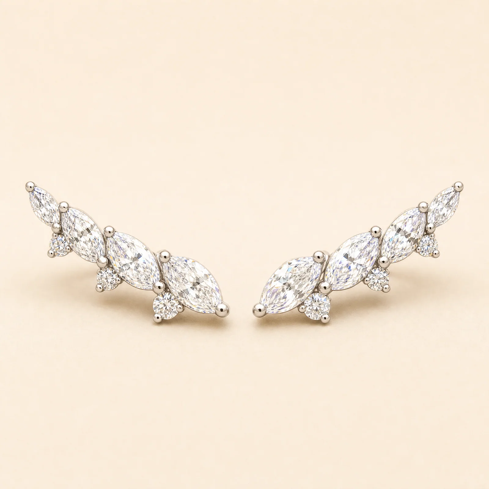 Eclipse Marquise Arc Earrings — official catalogue photo