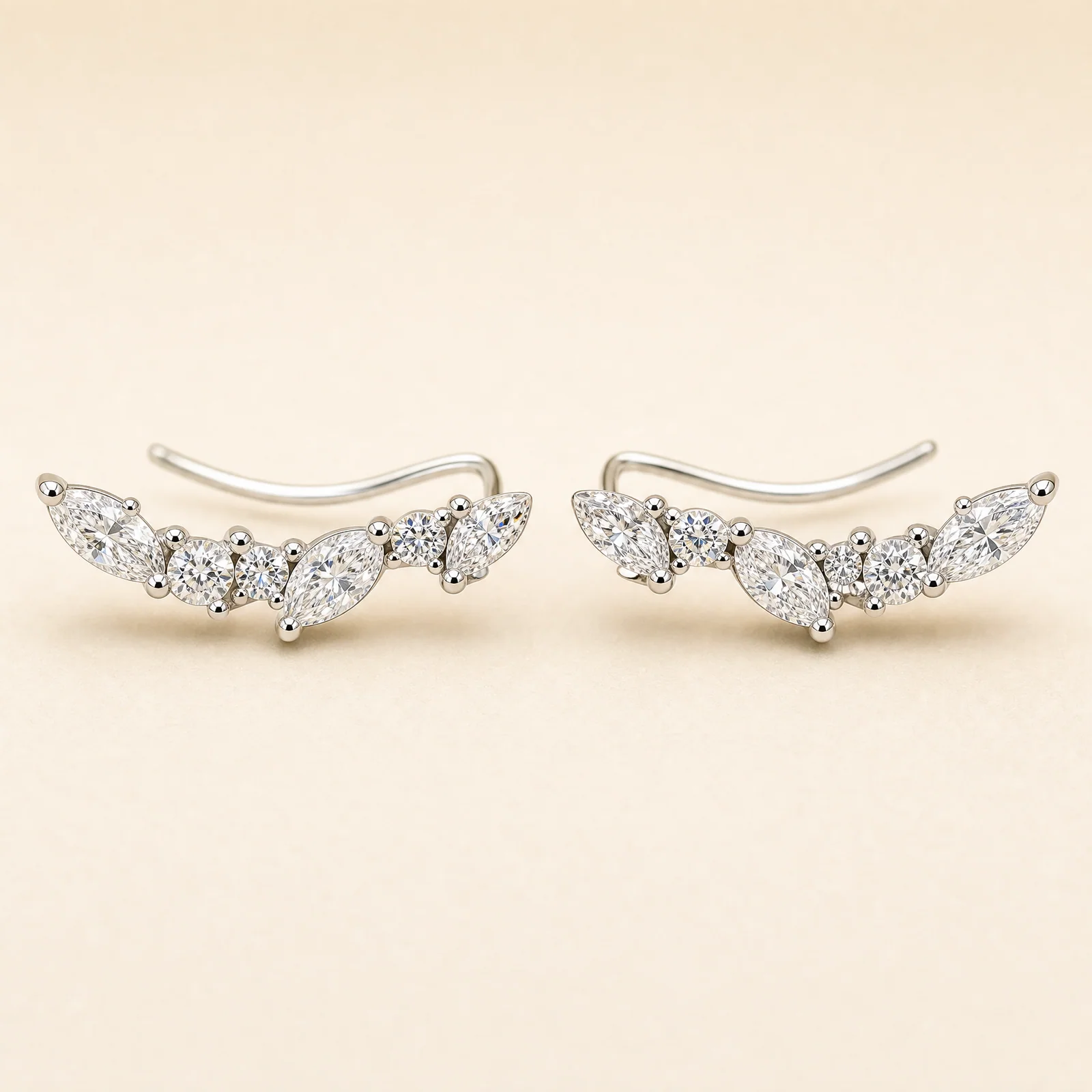 Crescent Marquise Arc Earrings — official catalogue photo