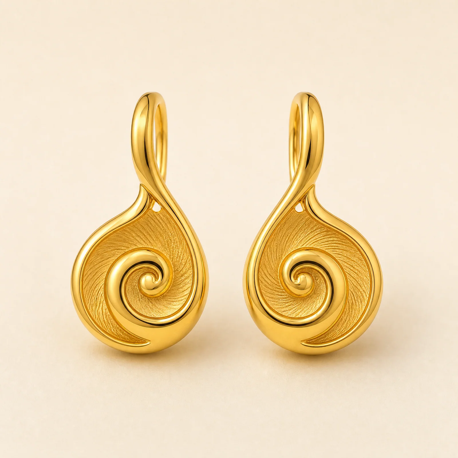 Atelier Spiral Shell Earrings — official catalogue photo