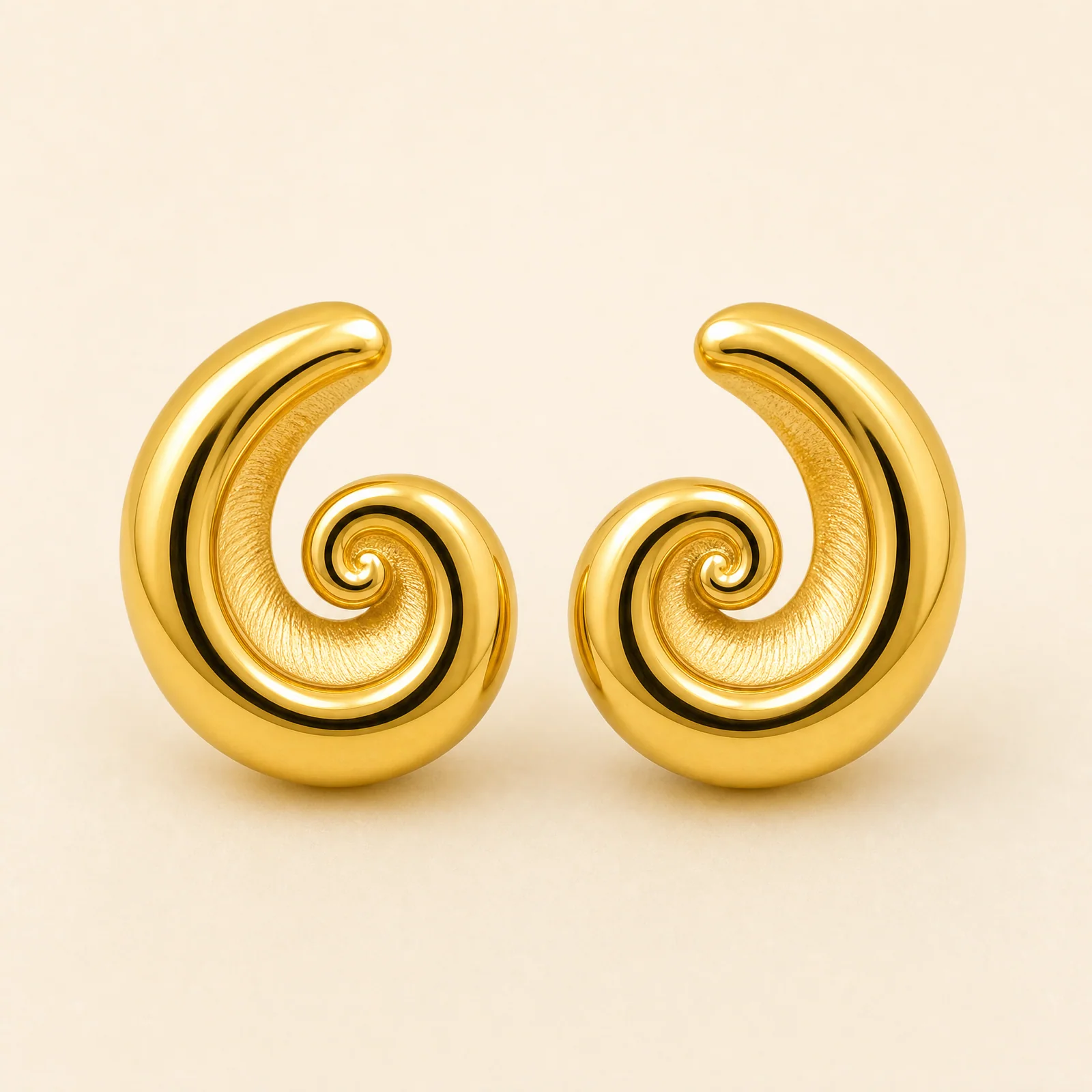 Eclipse Spiral Shell Earrings — official catalogue photo